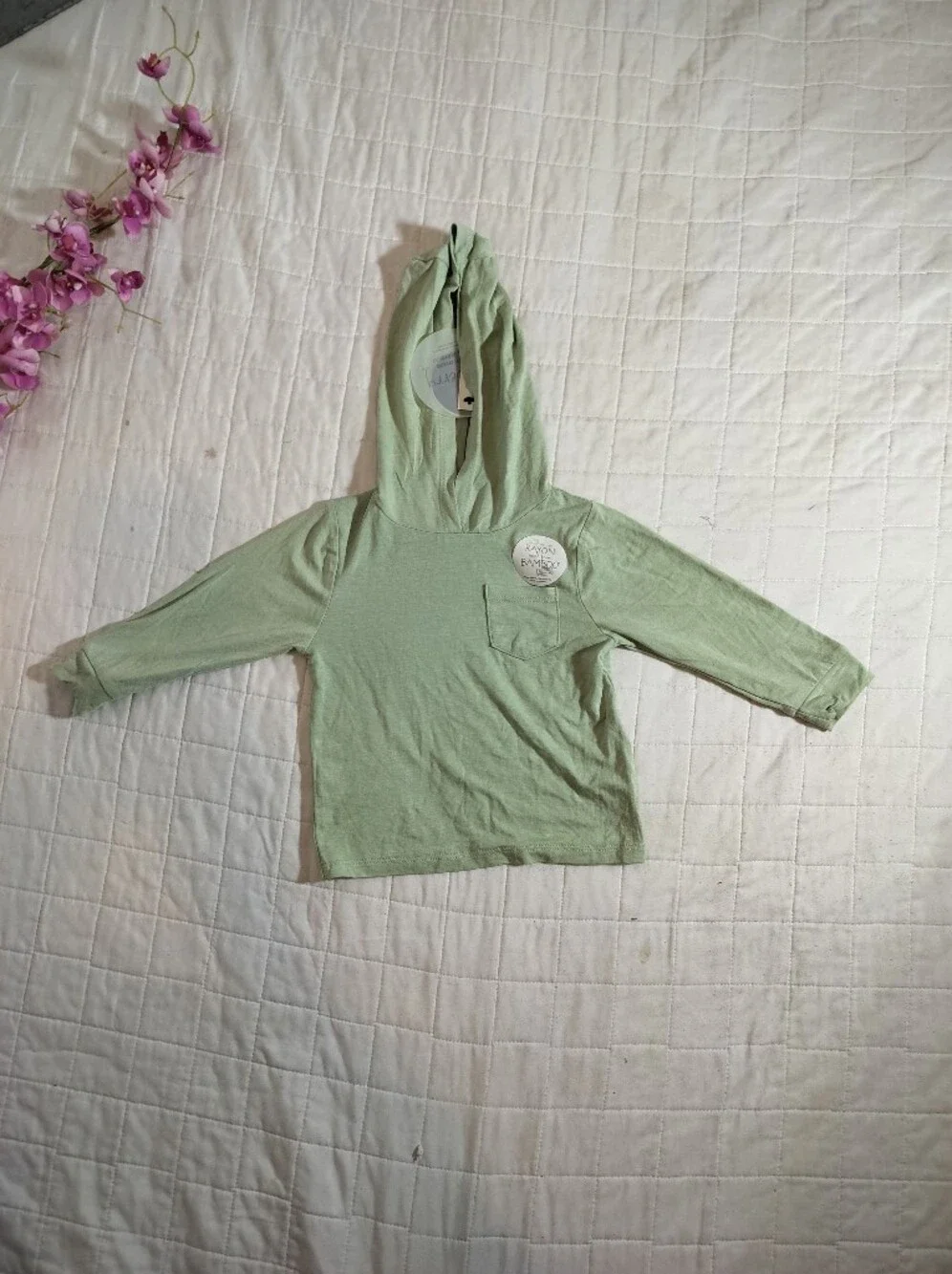 Green Hooded Top and Striped Shorts